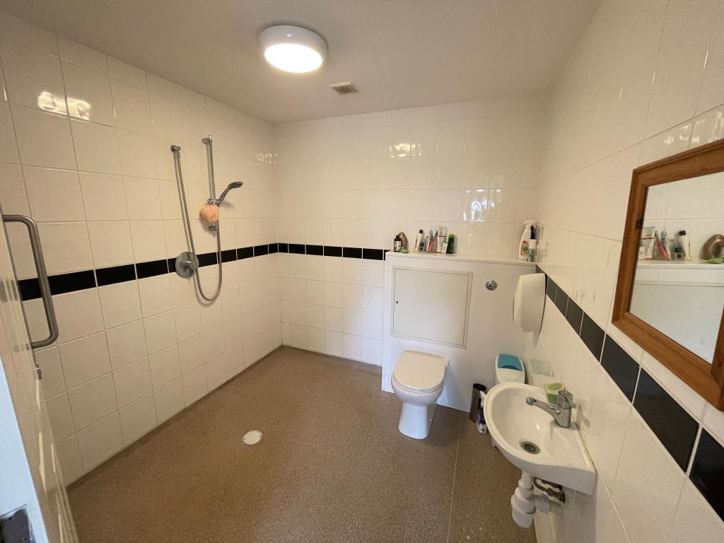 Lot: 98 - TWO FLATS AND ANNEX IN VILLAGE LOCATION - Wet room with toilet and hand basin